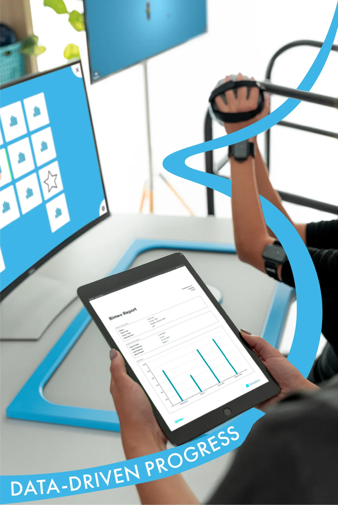 A therapist looking at a tablet showing patient data.